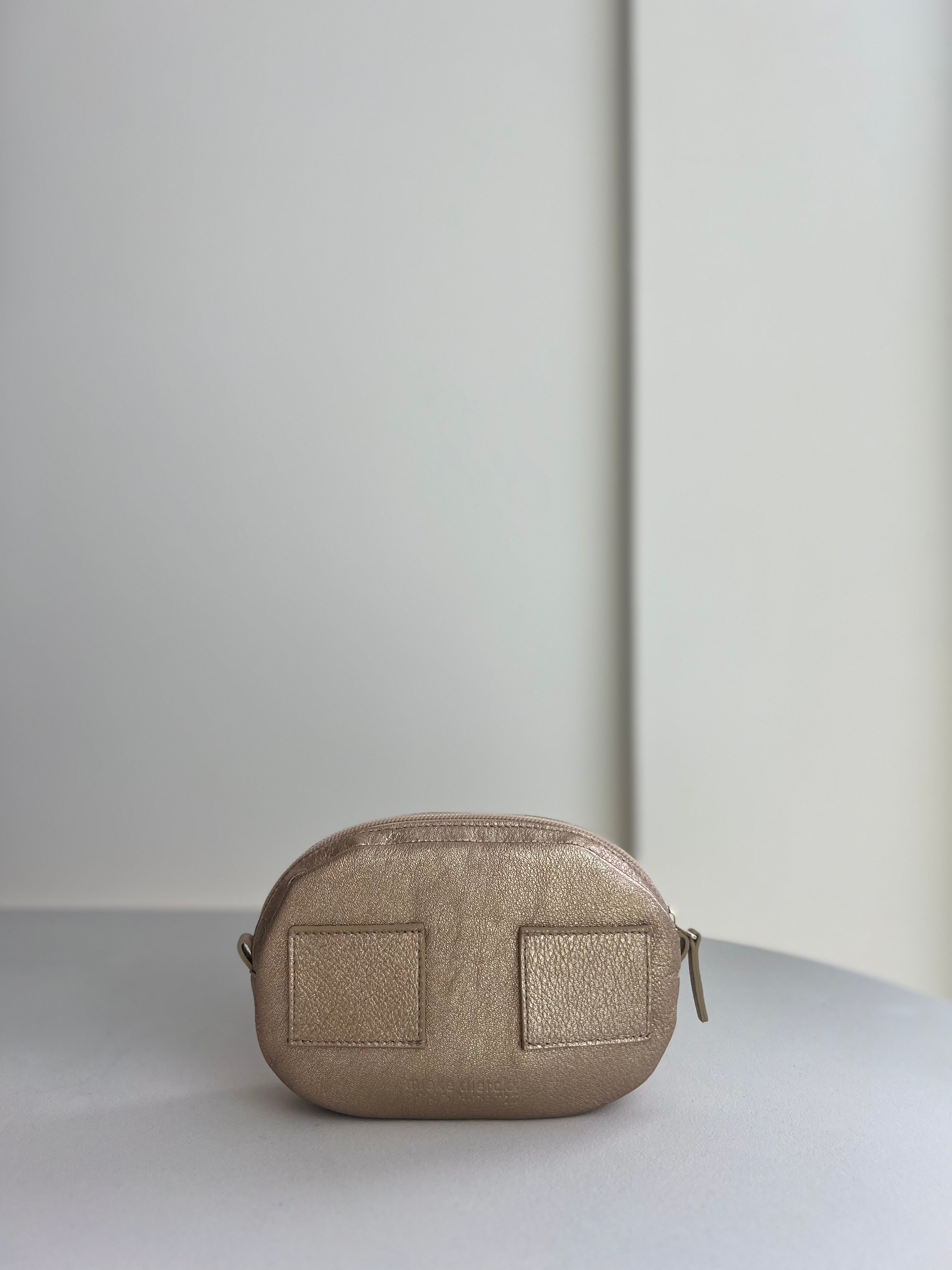 Oval mini bag soft gold